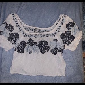 Off the shoulder blue and white crop top.